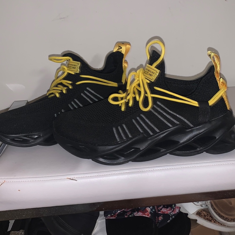 Black and yellow sneakers